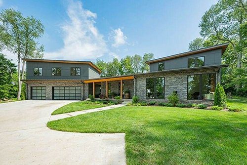 Stunning modern two-story home in Louisville by a leading custom home builder, showcasing expert design and craftsmanship