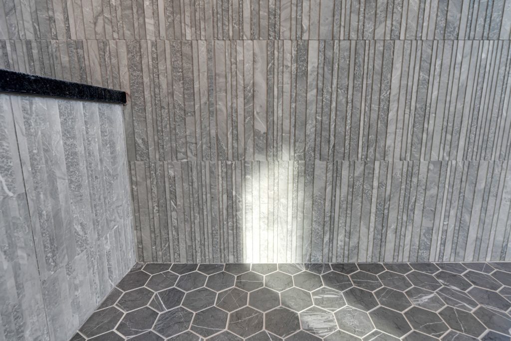 Louisville modern tile wall by top custom home builders featuring new home design ideas with hex floors and calm minimalist style.