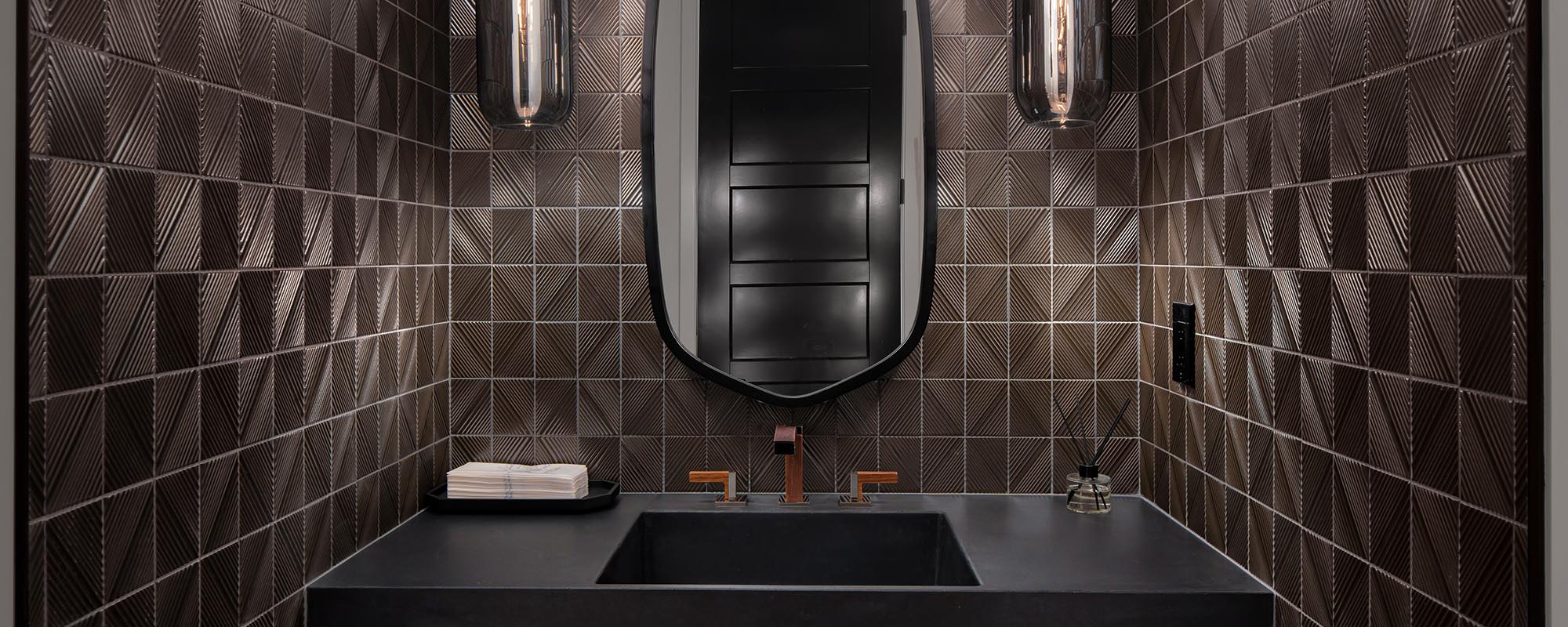 modern black tile and frank lloyd wright faucet brizo